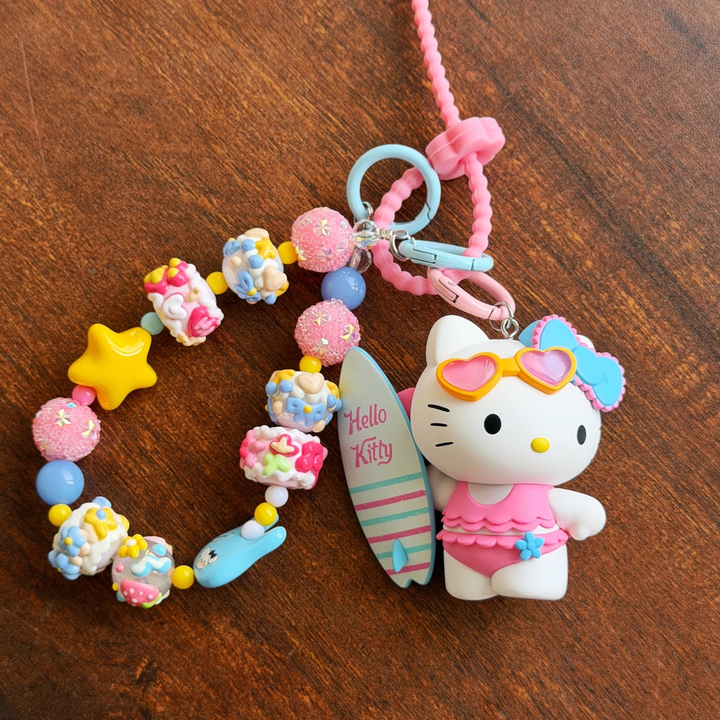 [RARE] Pop Mart Sanrio Hello Kitty South Island Surfing Charm Handmade Key/Phone Chain - Official Charm